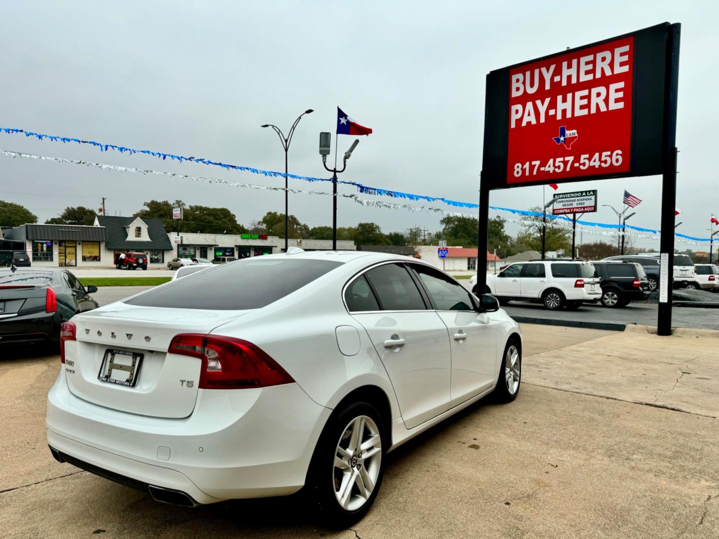 2015 WHITE VOLVO S60 PREMIER PLUS (YV140MFC3F1) , located at 5900 E. Lancaster Ave., Fort Worth, TX, 76112, (817) 457-5456, 0.000000, 0.000000 - This is a 2015 VOLVO S60 PREMIER PLUS 4 DOOR SEDAN that is in excellent condition. There are no dents or scratches. The interior is clean with no rips or tears or stains. All power windows, door locks and seats. Ice cold AC for those hot Texas summer days. It is equipped with a CD player, AM/FM radi - Photo#6